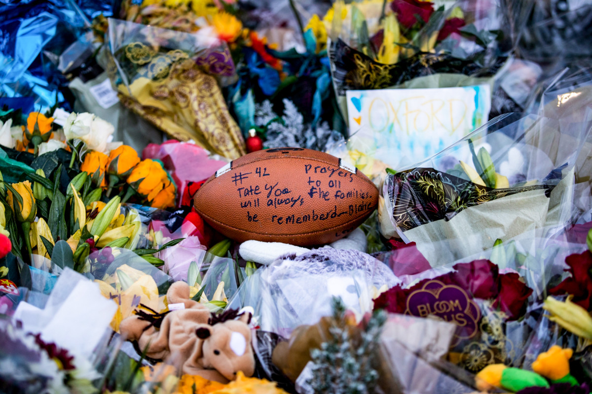Among the deceased: a beloved football star. In the aftermath, stories spread about what happened to Myre on the day of the shooting.